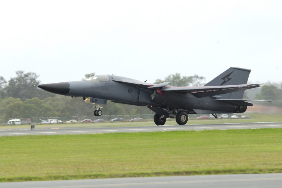 The final F-111 take-off. No6 Squadron aircraft, A8-109 lifts off from the Amberley runway to commence its final flight.
