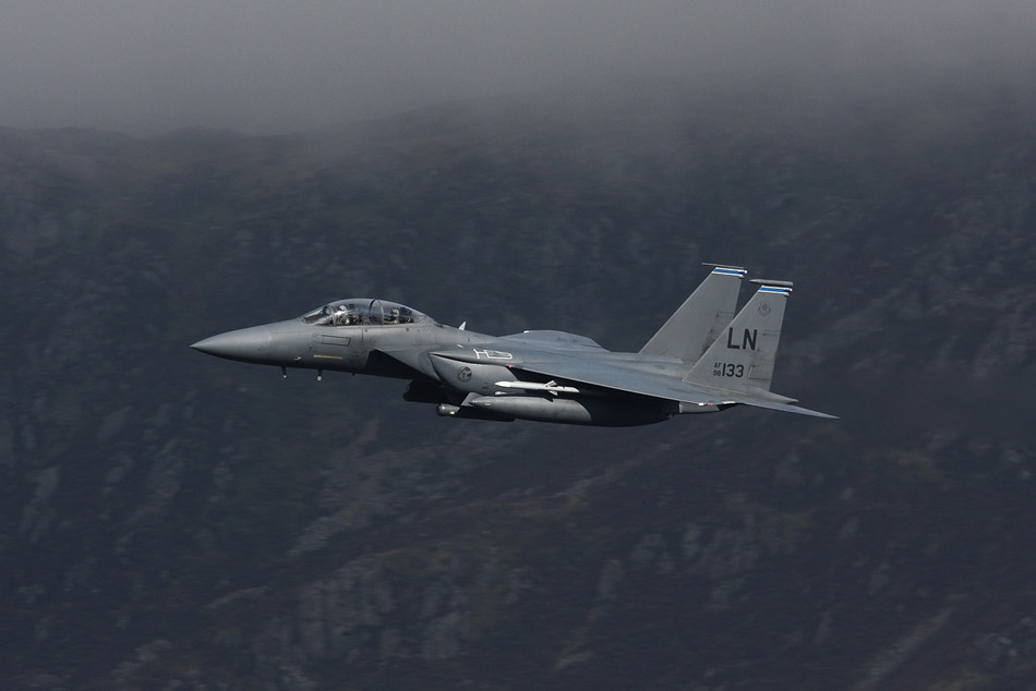 492 FS, 48 FW F-15E Strike Eagle (98-0133 'LN') just below the mountain top cloud