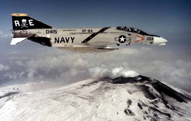 F-4N Phantom II (VF-84 / CVW-6) embarked on USS Franklin D. Roosevelt (CVA 42) flying over Mt. Etna, Sicily, Italy - 1975