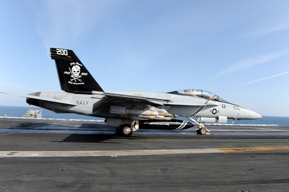 130324-N-MD211-360 NORTH ARABIAN SEA (March 24, 2013) An F/A-18F Super Hornet from the Jolly Rogers of Strike Fighter Squadron (VFA) 103 launches from the flight deck of the aircraft carrier USS Dwight D. Eisenhower (CVN 69) on the ship’s first day of combat air sorties of 2013 in support of Operation Enduring Freedom. Dwight D. Eisenhower is deployed to the U.S. 5th Fleet area of responsibility promoting maritime security operations, theater security cooperation efforts and support missions as part of Operation Enduring Freedom. (U.S. Navy photo by Mass Communication Specialist Seaman Lauren Booher/Released)