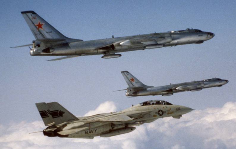 F-14A Tomcat VF-1 CVW-2 embarked on USS Kitty Hawk CV 63 with two Sovjet Tupolev Tu-16 Badger aircraft - Indian Ocean 1984
