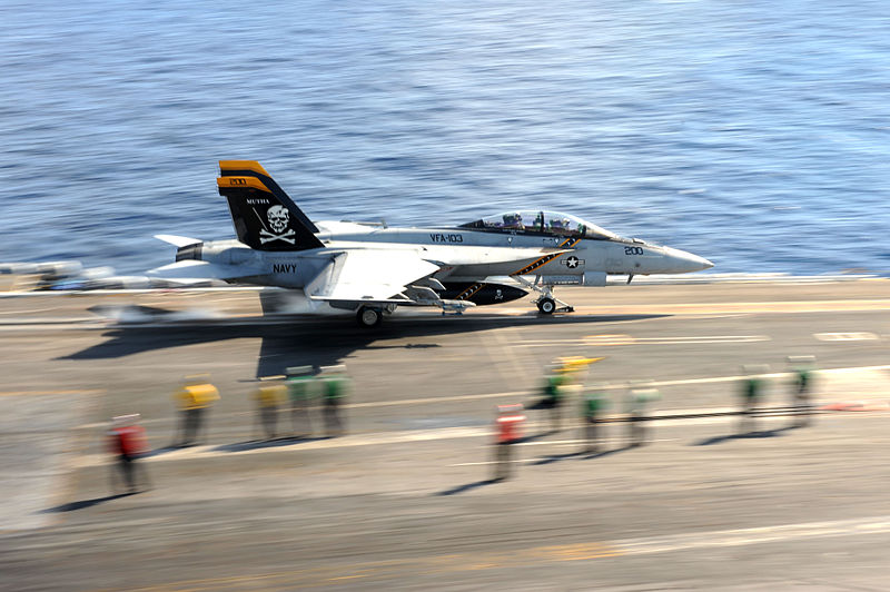 An FA-18F Super Hornet assigned to the Jolly Rogers of Strike Fighter Squadron (VFA) 103 launches from the flight deck of the aircraft carrier USS Dwight D. Eisenhower (CVN 69).
