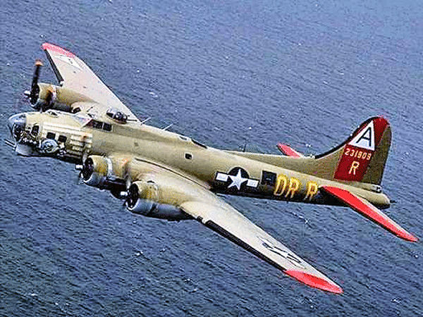 The Collings Foundation B-17G flying in the colours of Nine-O-Nine, 323rd BS B-17G
