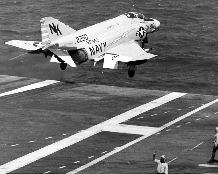 A U.S. Navy McDonnell F-4B-22-MC Phantom II (BuNo 152250) from Fighter Squadron 142 (VF-142) "Ghost Riders" leaps from the flight deck of the aircraft carrier USS Constellation (CVA-64) for a strike mission over Vietnam, in January 1969. VF-142 was assigned to Carrier Air Wing 14 (CVW-14) aboard the Constellation for a deployment to Vietnam from 29 May 1968 to 31 January 1969.