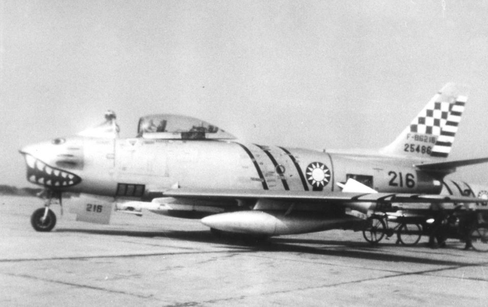 ROCAF F-86F-25-NH at Chia AB, November 1958, may be fresh from combat. Note empty underwing Sidewinder launch rail and smudges around the gun ports.