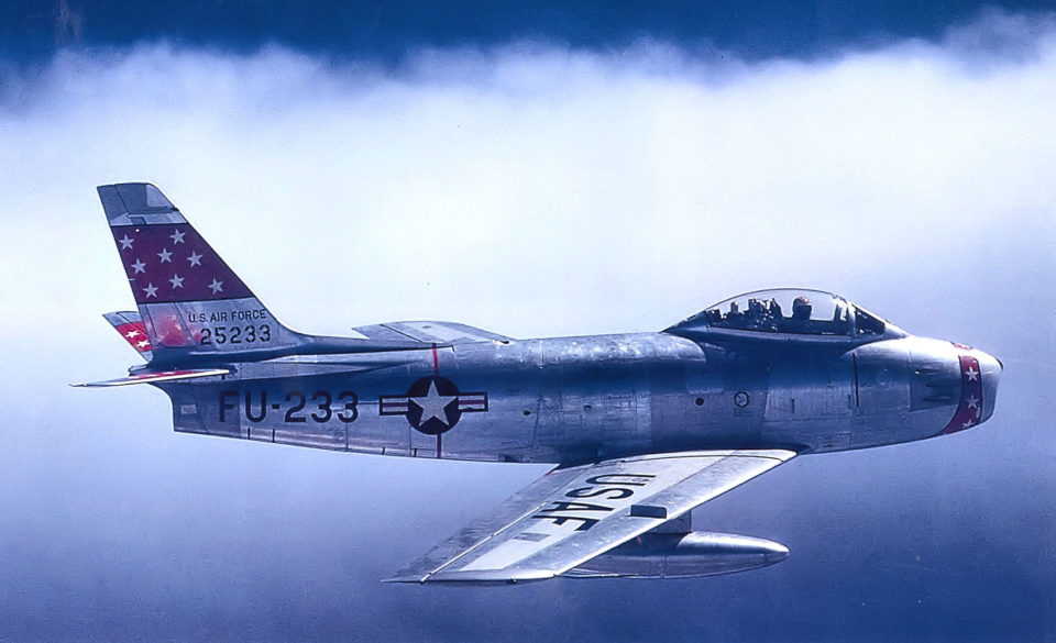 The F-86 Sabre (left), flown by Jabara, was used to shoot down all of his 15 MiG-15 (right) air victories of the Korean War