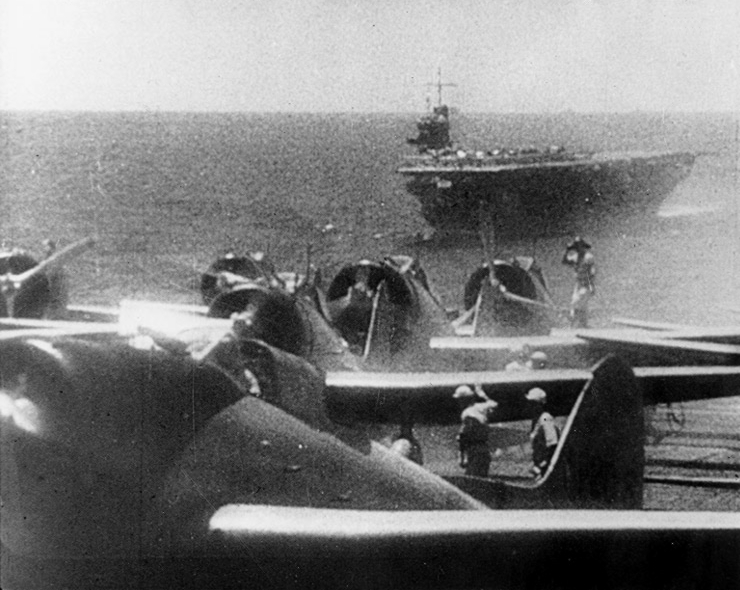 Japanese Val dive bombers prepare to launch for the second wave (carrier Soryu in background)