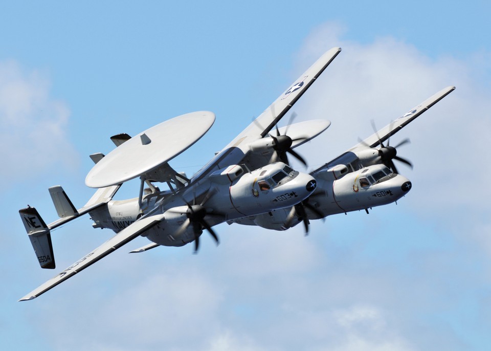 080929-N-7981E-089 PACIFIC OCEAN (Sept. 29, 2008) A pair of E-2C Hawkeyes assigned to the "Sun Kings" of Airborne Early Warning Squadron (VAW) 116 pass over the aircraft carrier USS Abraham Lincoln (CVN 72) during an air power demonstration performed by aircraft from Carrier Air Wing (CVW) 2. U.S. Navy photo by Mass Communication Specialist 2nd Class James R. Evans (Released)