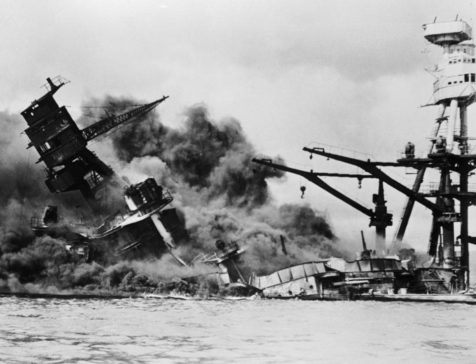 USS Arizona burning and sinking