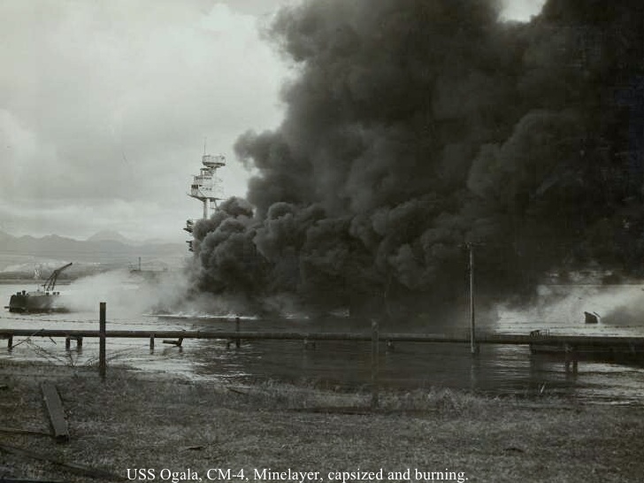USS Ogala, CM-4, Minelayer, capsized and burning.